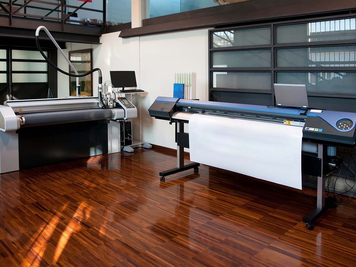 A large room with a huge printer