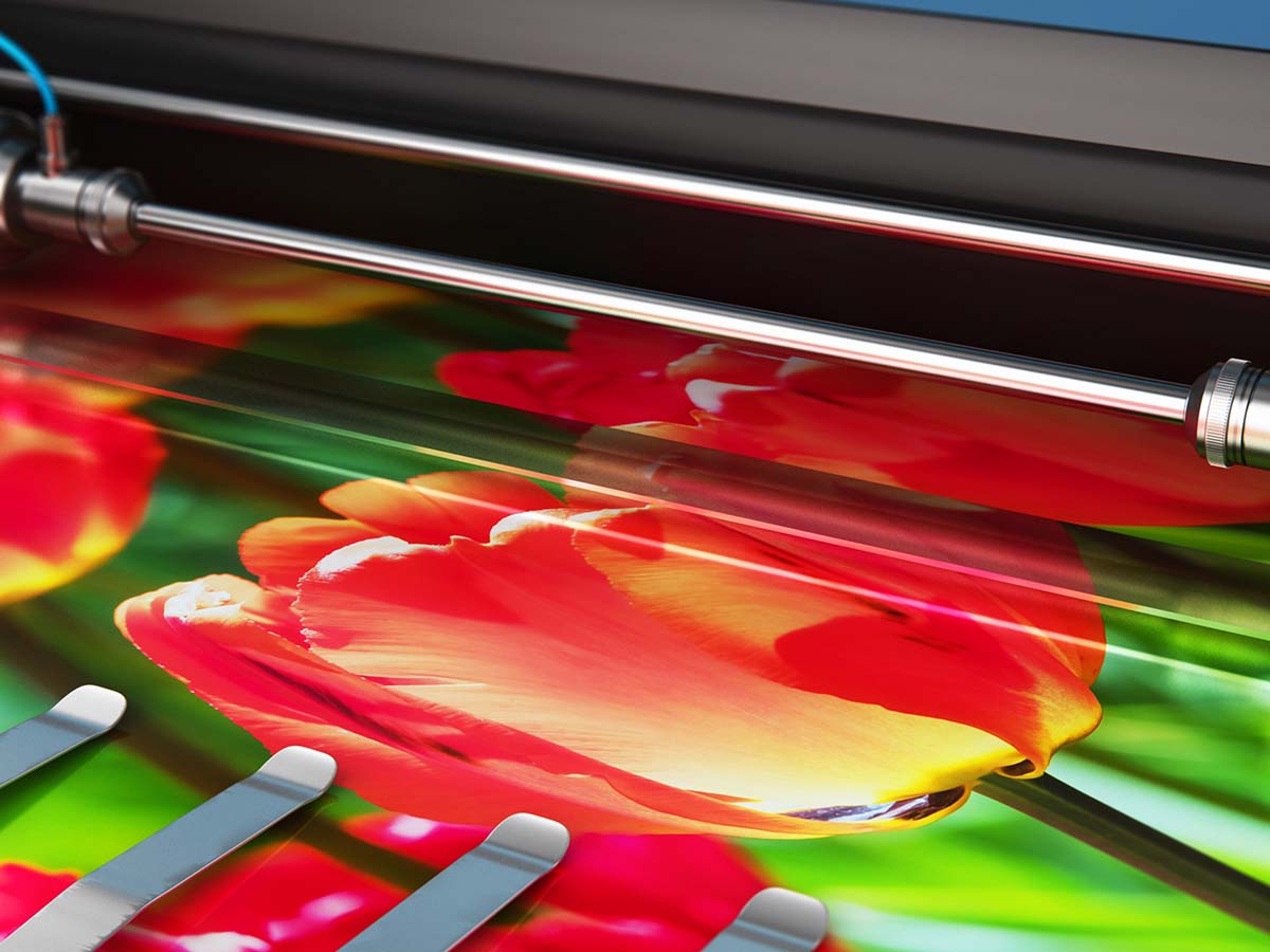 A printer printing an image of tullips